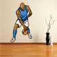 Basketball wall decal sticker of dribbling player in blue jersey holding basketball