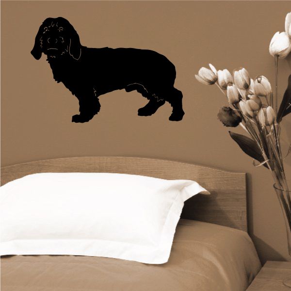 Black dog silhouette decal with short legs and long ears