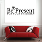 Wall decal text: "the Be Present FOR YOUR CHILDREN" in black