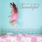Wall decal featuring “Be Your Own Kind of Beautiful” in ornate script lettering