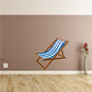 Beach chair wall sticker with striped blue-and-white folding chair