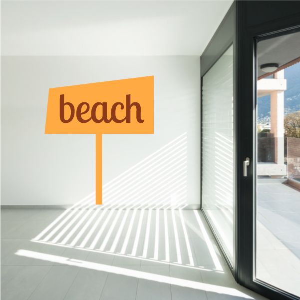 Orange wall decal beach sign with lowercase "beach" text