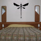 Black beaded dragonfly wall decal with dotted body and small hanging beads