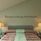 Wall quote decal with text: "Beauty is in the eye of the beholder."