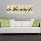 Script and block text decal reading “BELIEVE in the miracle”