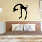 Black giraffe wall decal silhouette bending forward with head down