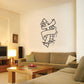 Cross with ribbon wall decal in black line art on a light wall