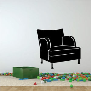 Black chair wall decal with white line art and armchair silhouette