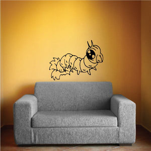 Caterpillar wall decal with big eyes eating through, black and white line art