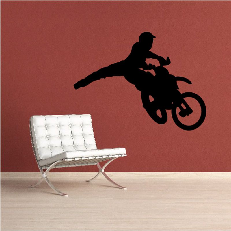 Dirt bike decal with black rider silhouette mid-kick on bike