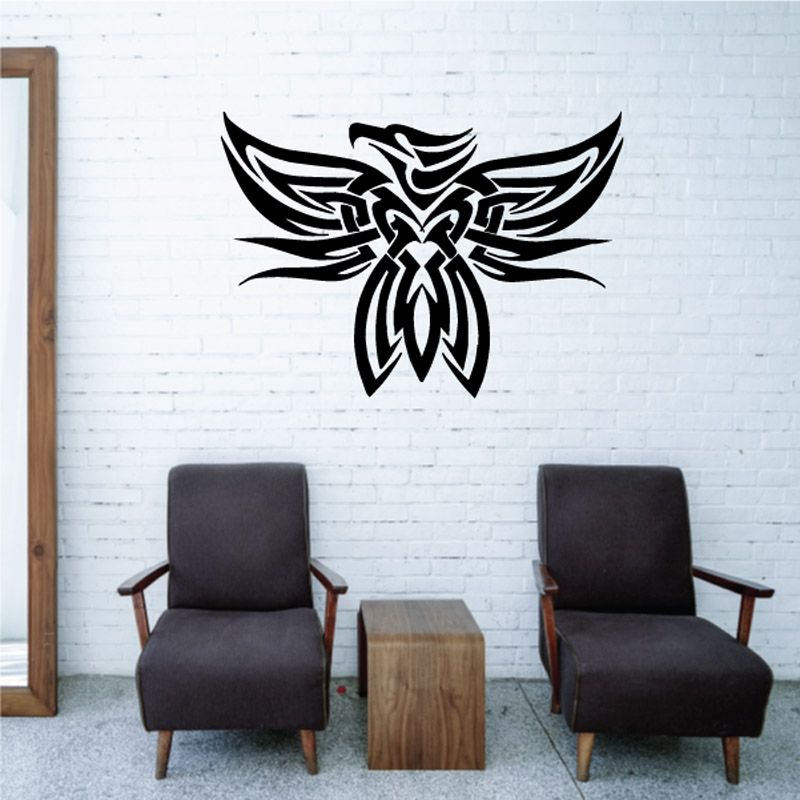 Black stylized bird wall decal with tribal wings and detailed graphic center
