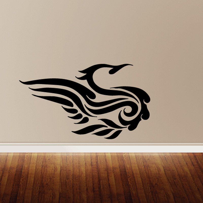 Bird vinyl wall decal with black tribal-style silhouette and swirling wings