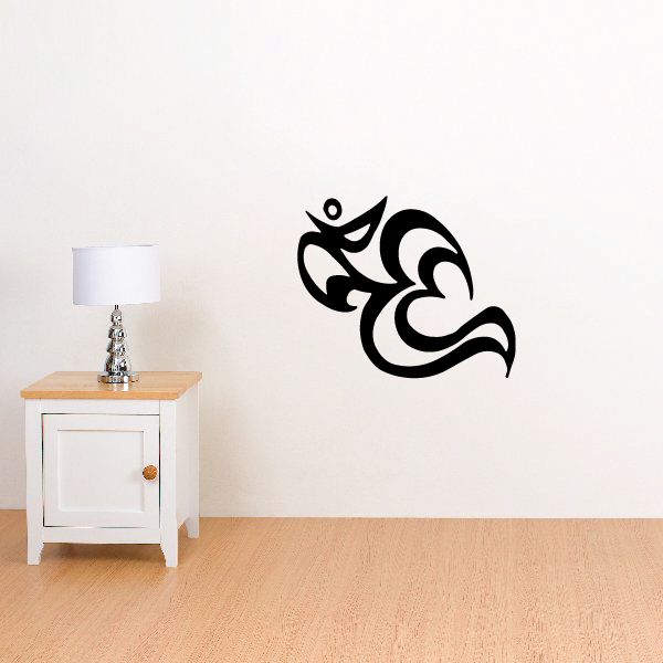 Black tribal bird vinyl wall decal with curled shapes and eye detail