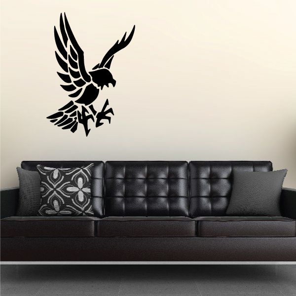Black vinyl bird wall decal with wings spread and detailed feathers