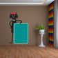 Black cat sign sticker with teal square board and red pointing arrow