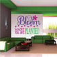 Printed die-cut wall decal: purple "Bloom Where You Are Planted" lettering and flowers