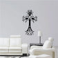 Floral cross wall decal, black outline with starburst blossoms.