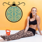 Blue ornament printed die cut decal: circular teal swirl design with black outline.