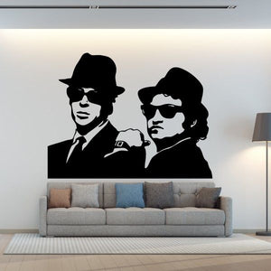 Black decal of two men in suits and hats, one wearing sunglasses