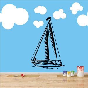 Vinyl sailboat wall decal with black sails and white clouds