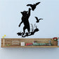 Bobcat catching bird decal - black silhouette wall sticker with bird above