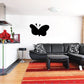 Black butterfly wall decal sticker, three-piece set above seating area
