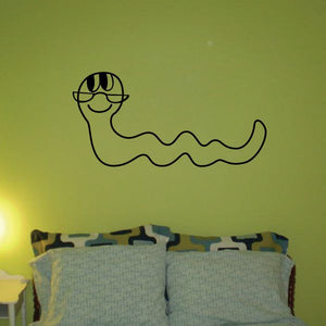 Black line-art bookworm wall decal with round glasses