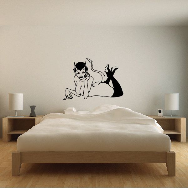 Devil girl wall decal, black outline illustration with horned catlike figure and pitchfork