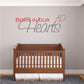 Wall decal text: "Born in our Hearts" with heart outline above.