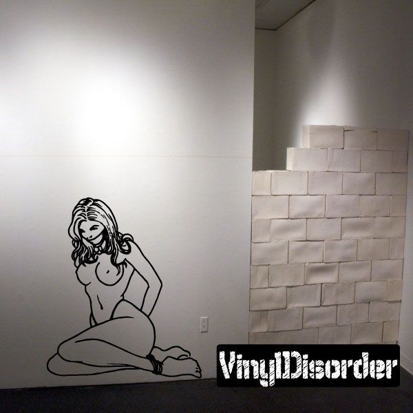 Black line art decal of a bound, gagged damsel kneeling on the floor