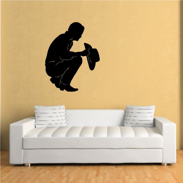 Bowing cowboy praying decal with black silhouette