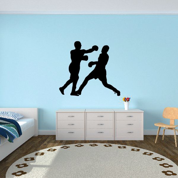 Boxing wall decal showing two black boxer silhouettes throwing punches