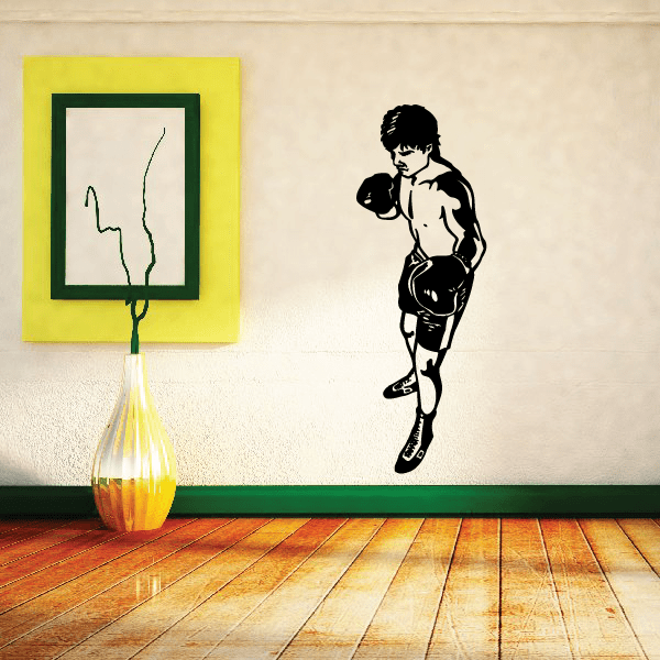 Boxing wall vinyl decal featuring a black boxer silhouette standing in guard pose
