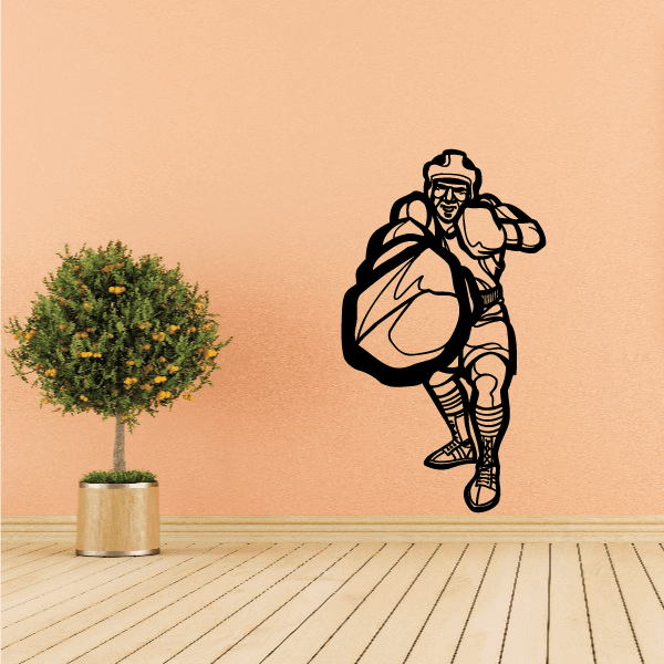 Vinyl boxing wall decal featuring cartoon boxer with raised boxing glove