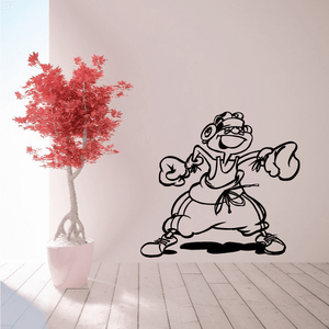 Boxing wall decal featuring a cartoon boxer mascot with gloves and bow tie