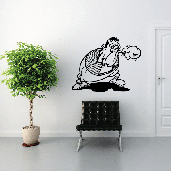 Boxing wall vinyl decal featuring a cartoon boxer punching a boxing glove