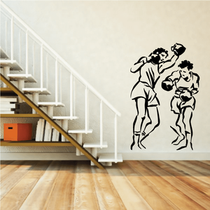 Black boxing wall decal featuring two fighters and a raised-arm pose