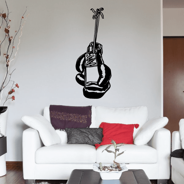 Black boxing wall decal of a boxer holding a jump rope, with gloves and wraps