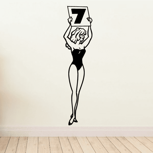 Boxing wall decal of a female boxer holding a “7” sign above her head