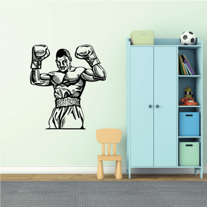 Black boxing wall decal vinyl sticker of muscular fighter raising both fists.