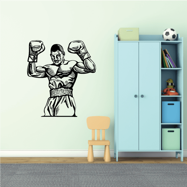 Black boxing wall decal vinyl sticker of muscular fighter raising both fists.