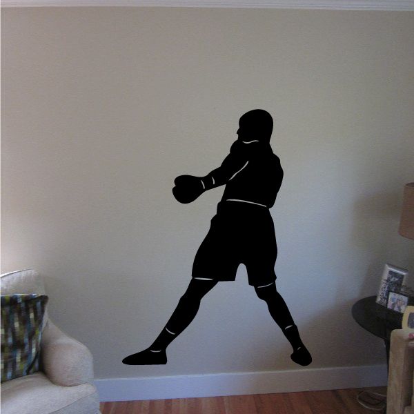 Black boxing wall vinyl decal of a standing boxer throwing a punch.