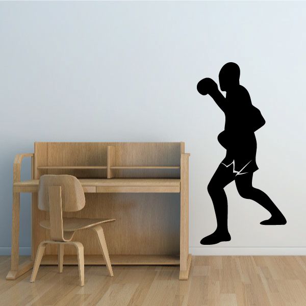 Boxing wall decal: black boxer silhouette throwing a punch