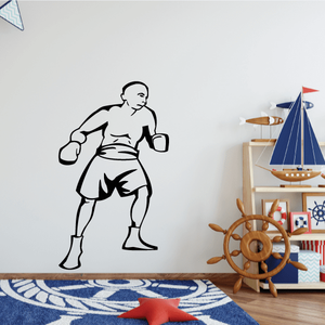 Black boxing wall decal featuring a boxer with raised fists and gloves