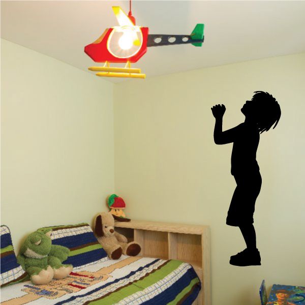 Praying boy silhouette decal with raised hands