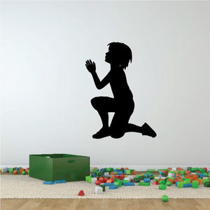 Praying boy on one knee decal, black silhouette