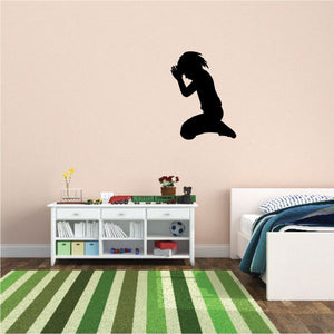 Praying boy decal with black silhouette, kneeling with hands clasped