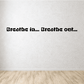 Wall decal, black text: Breathe in... Breathe out...