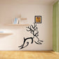 Brush style reindeer decal, black outline with antlers and bow