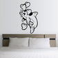 Dolphin wall decal with floating hearts, black outline on light background
